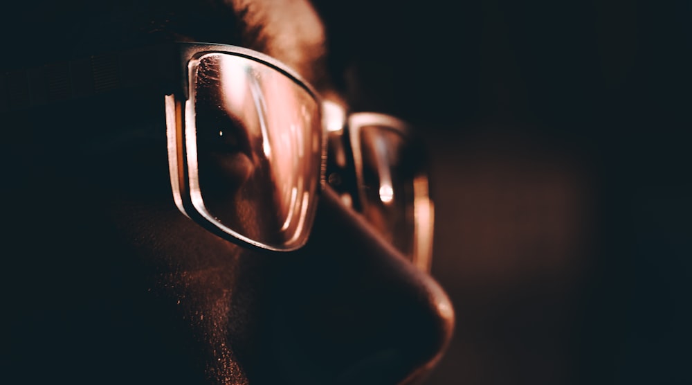 man wearing black framed eyeglasses