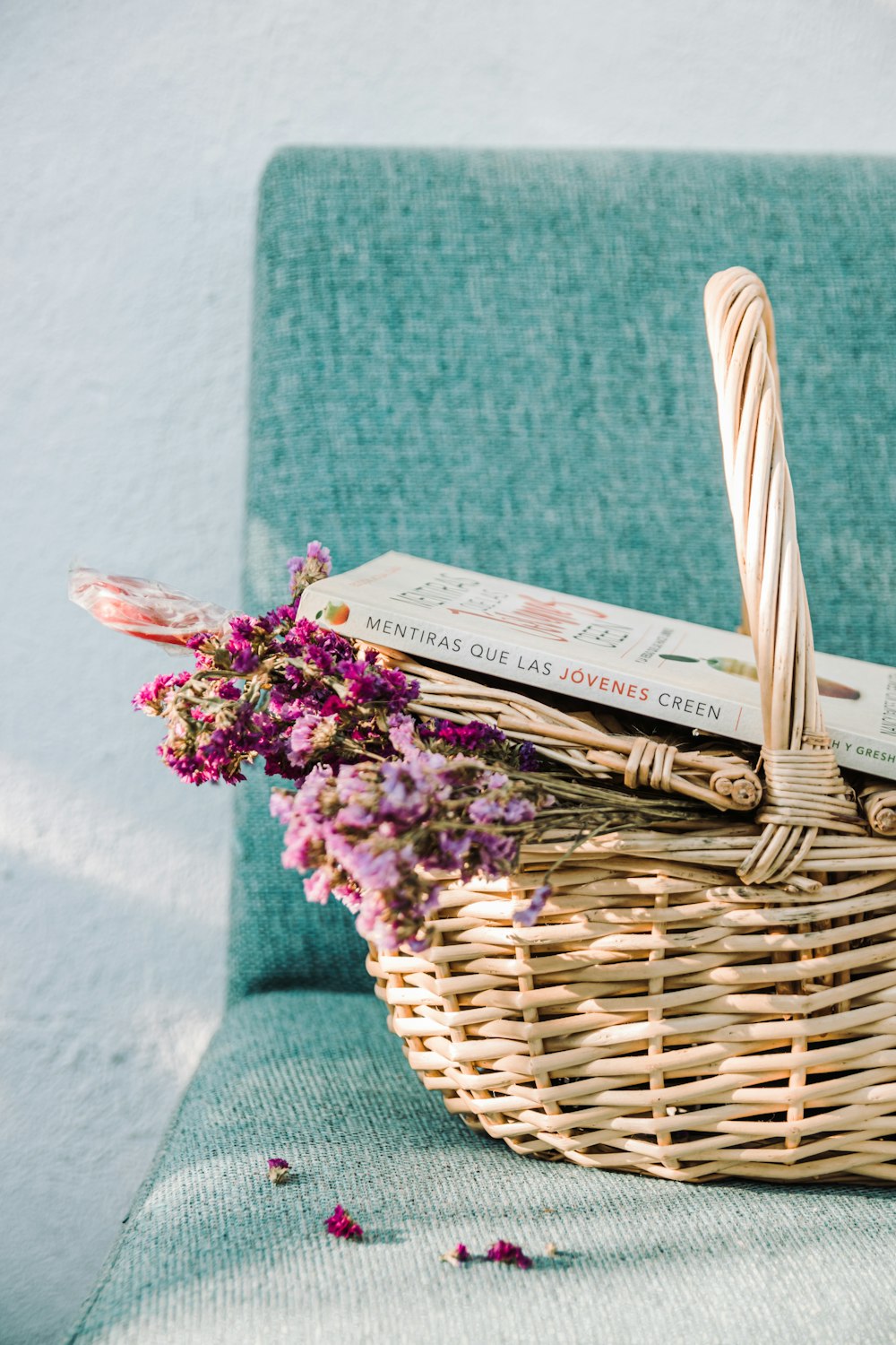 brown woven basket on green textile