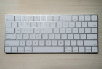Compact wireless keyboard with minimalist design on a clean white surface