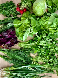 Fresh vegetables and herbs from an organic garden ready for cooking.