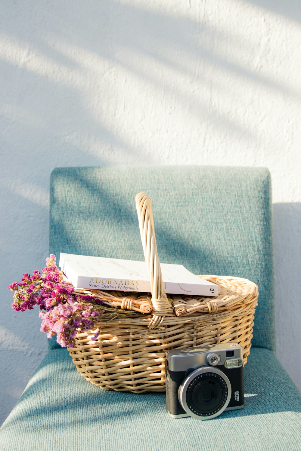 green towel on brown woven basket