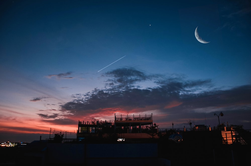 silhouette of buildings during sunset