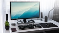 A close-up of a modern desktop setup featuring AI technology on the screen.