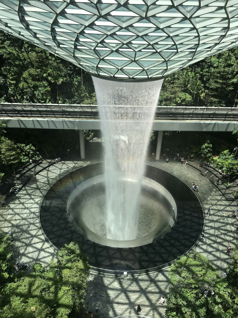 water fountain in the middle of the garden