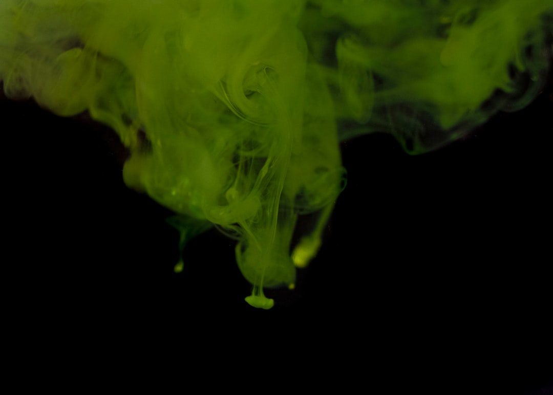 green smoke in black background