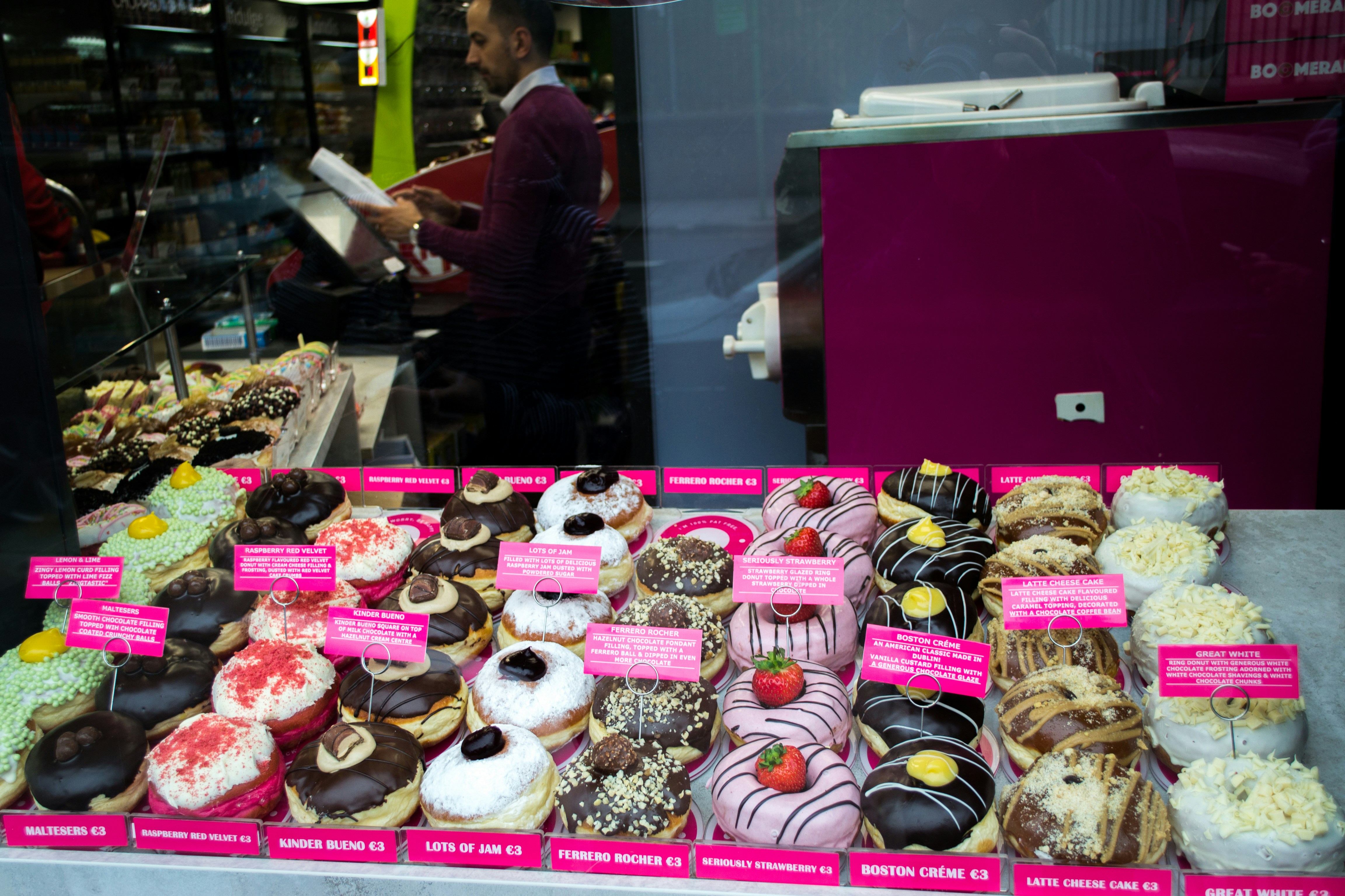assorted cupcakes on display counter