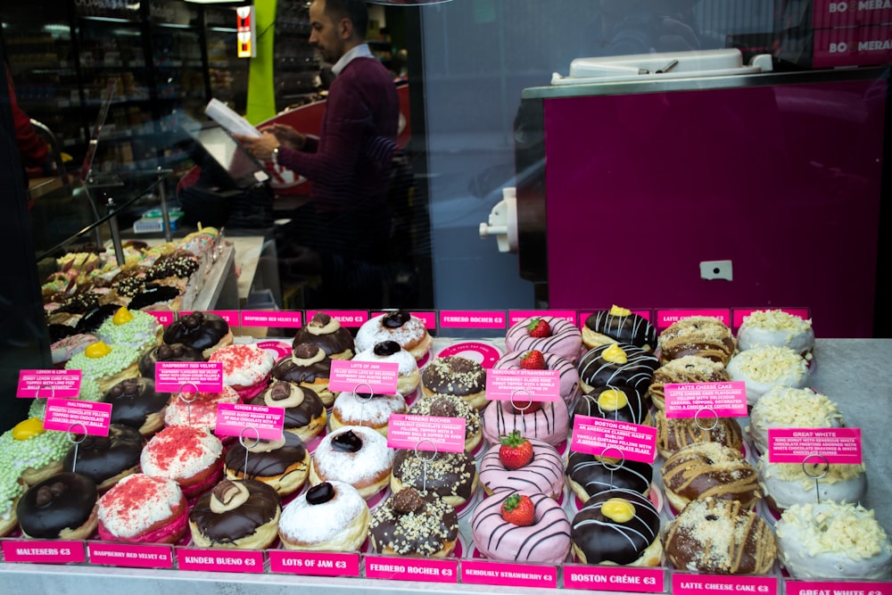 assorted cupcakes on display counter