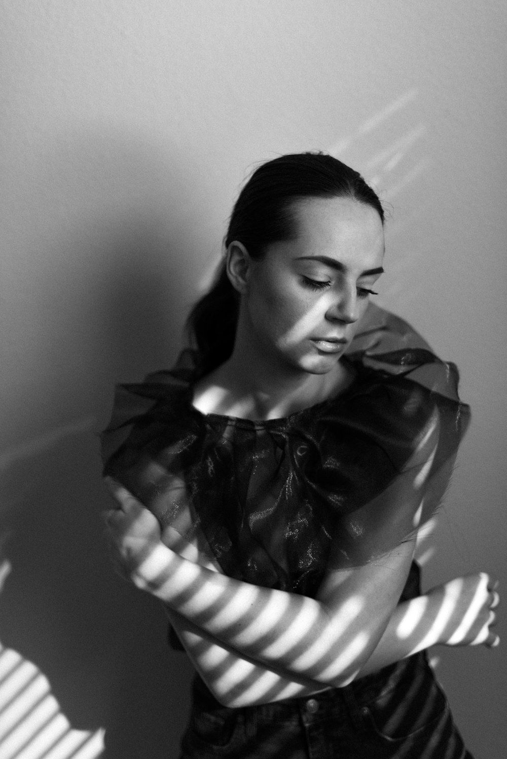 woman in black and white striped shirt