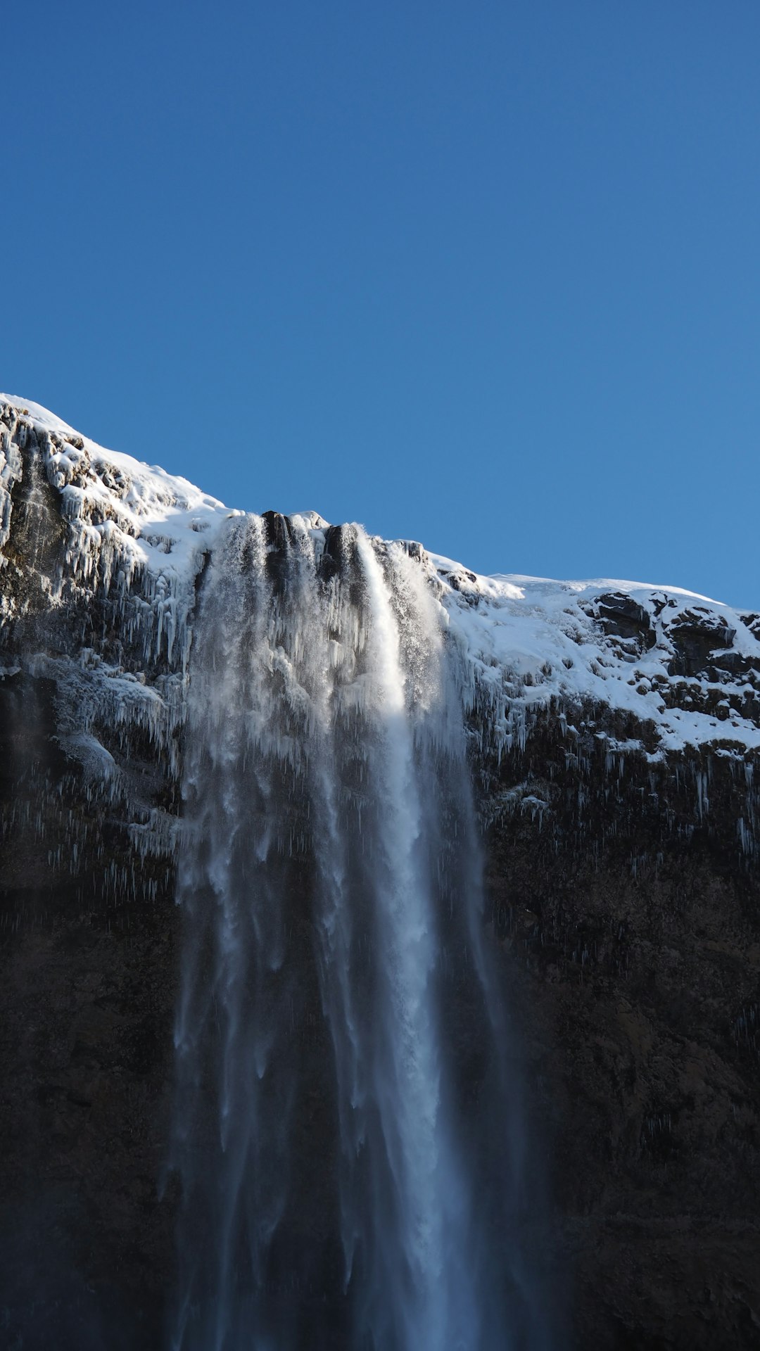 white snow covered mountain under blue sky during daytime