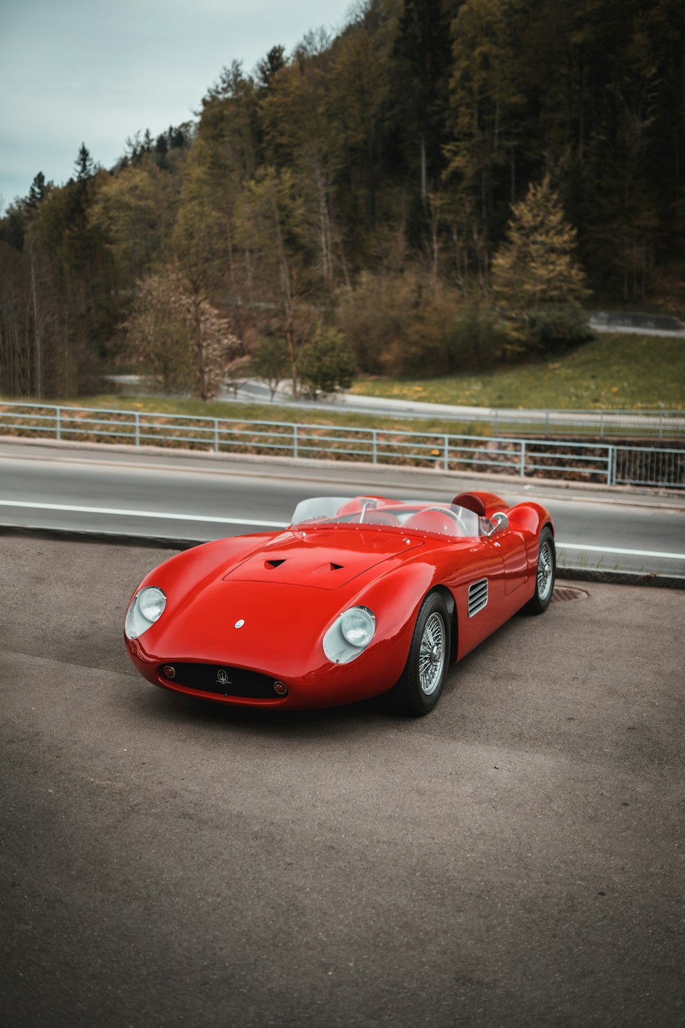 red ferrari 458 italia on road during daytime