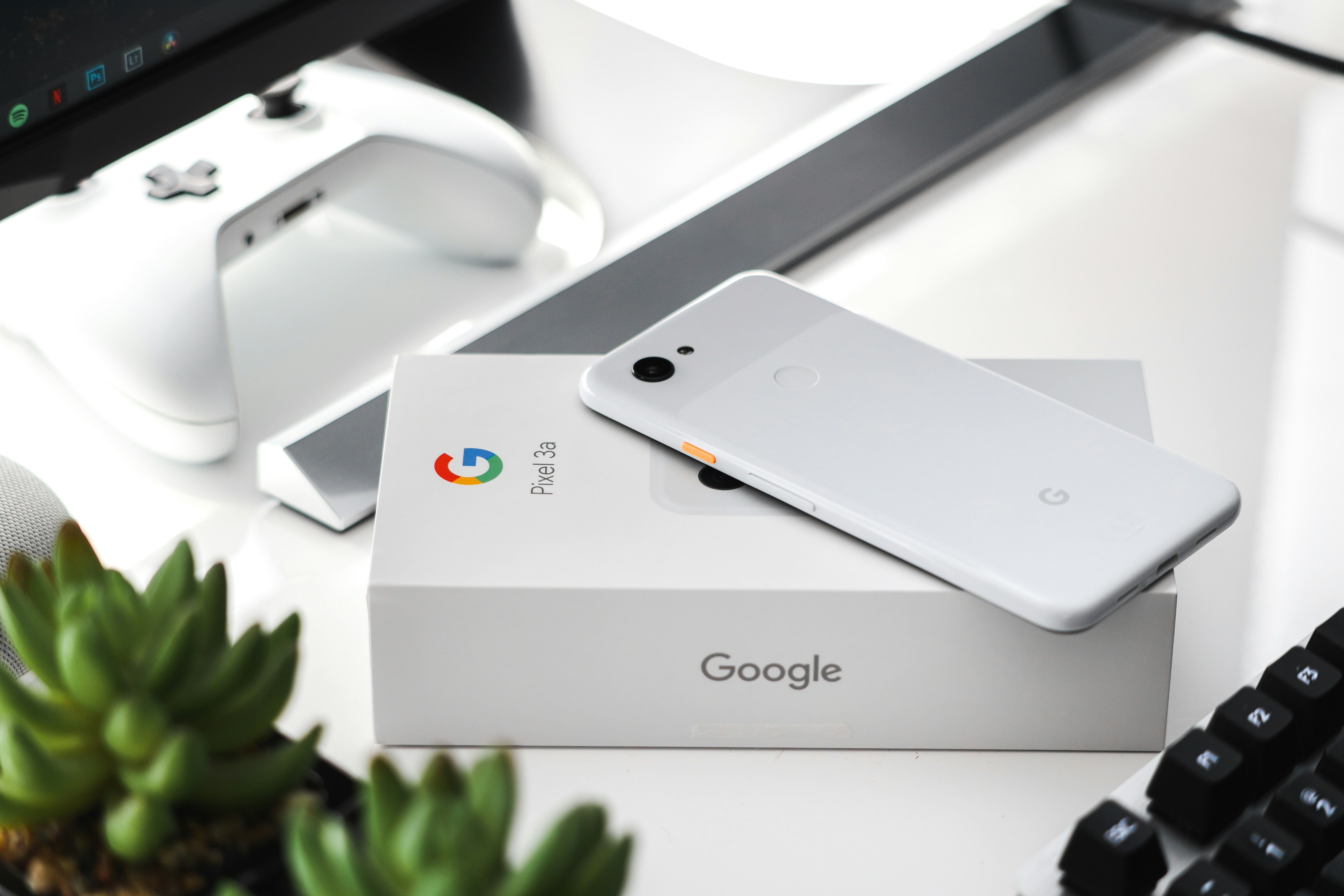 Google Pixel smartphone displaying AI assistant interface on desk