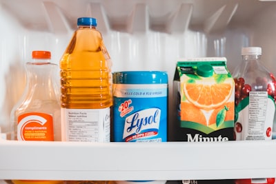 a refrigerator filled with lots of different types of drinks