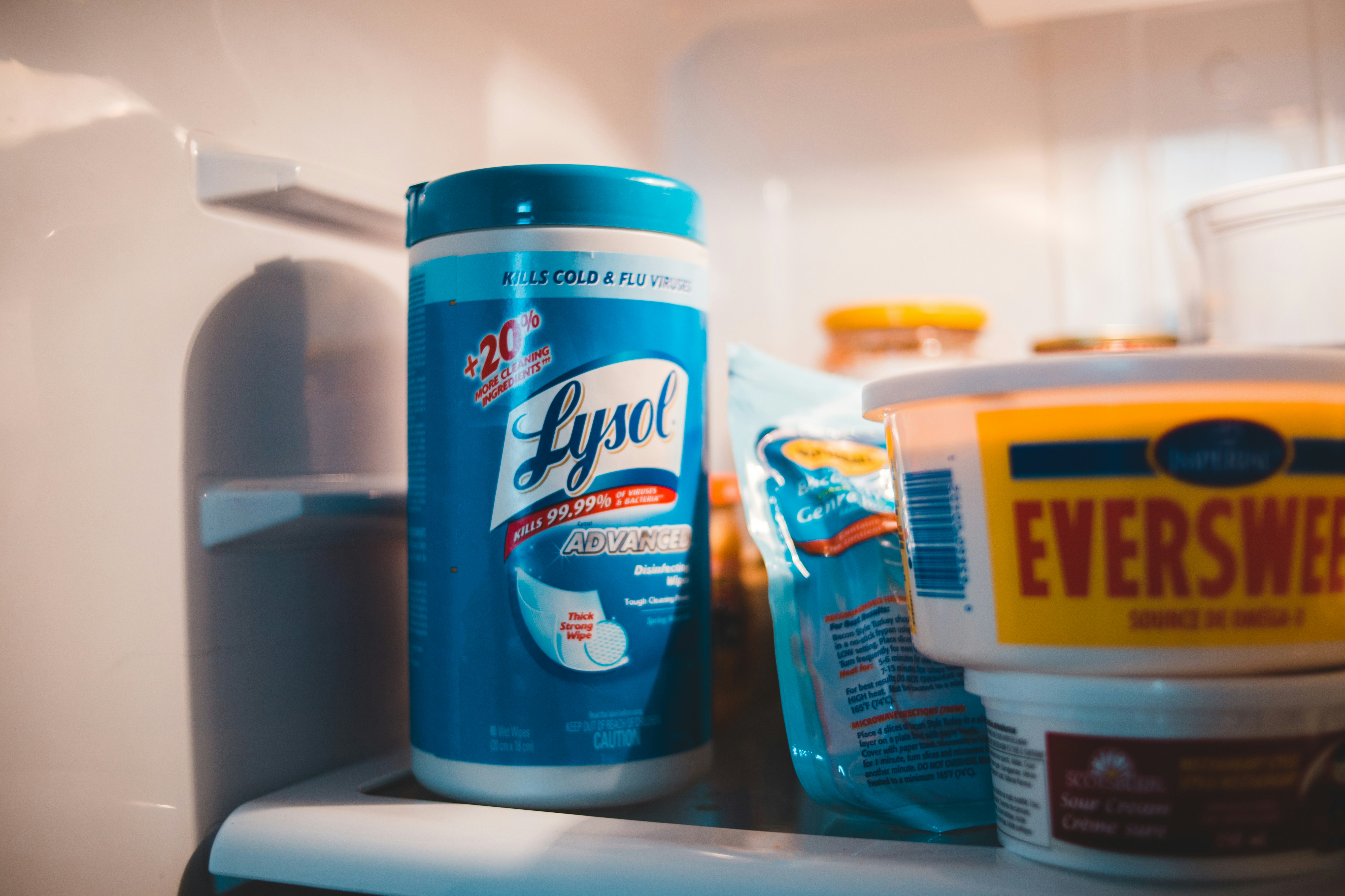 A close up of a can of food in a refrigerator photo Free Alcohol