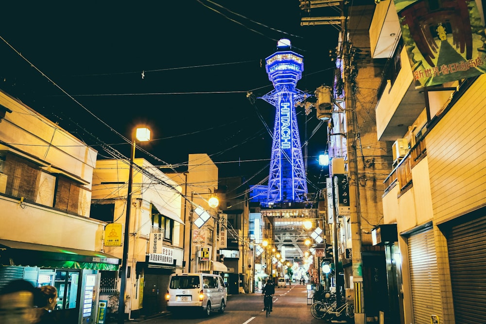 people walking on street during night time