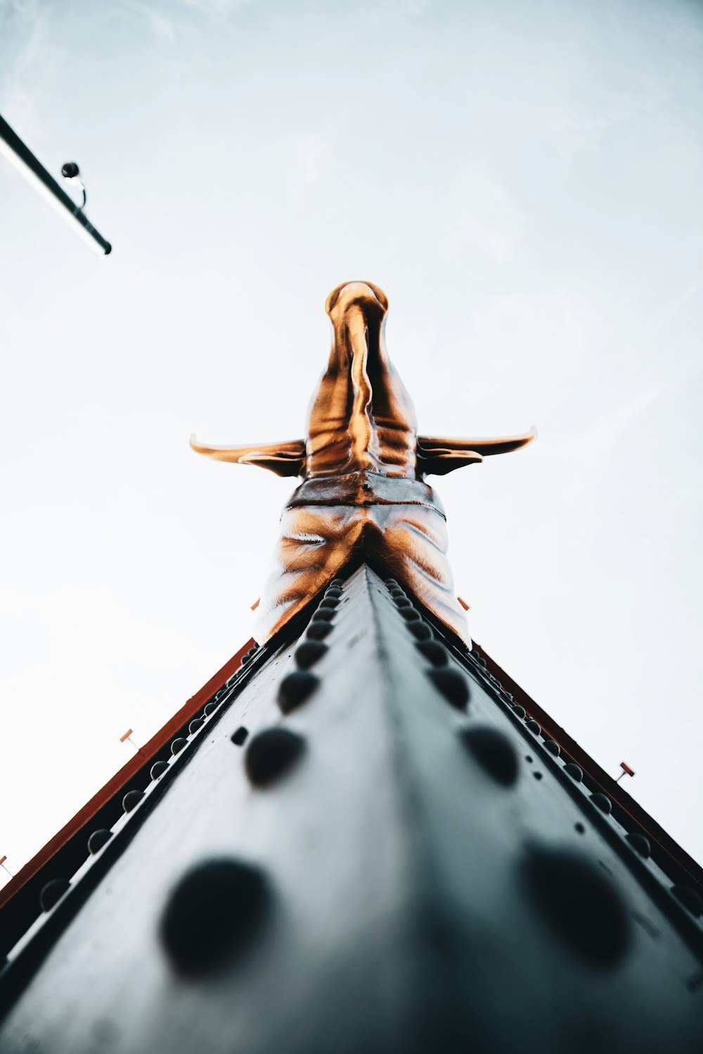 brown wooden jesus christ figurine