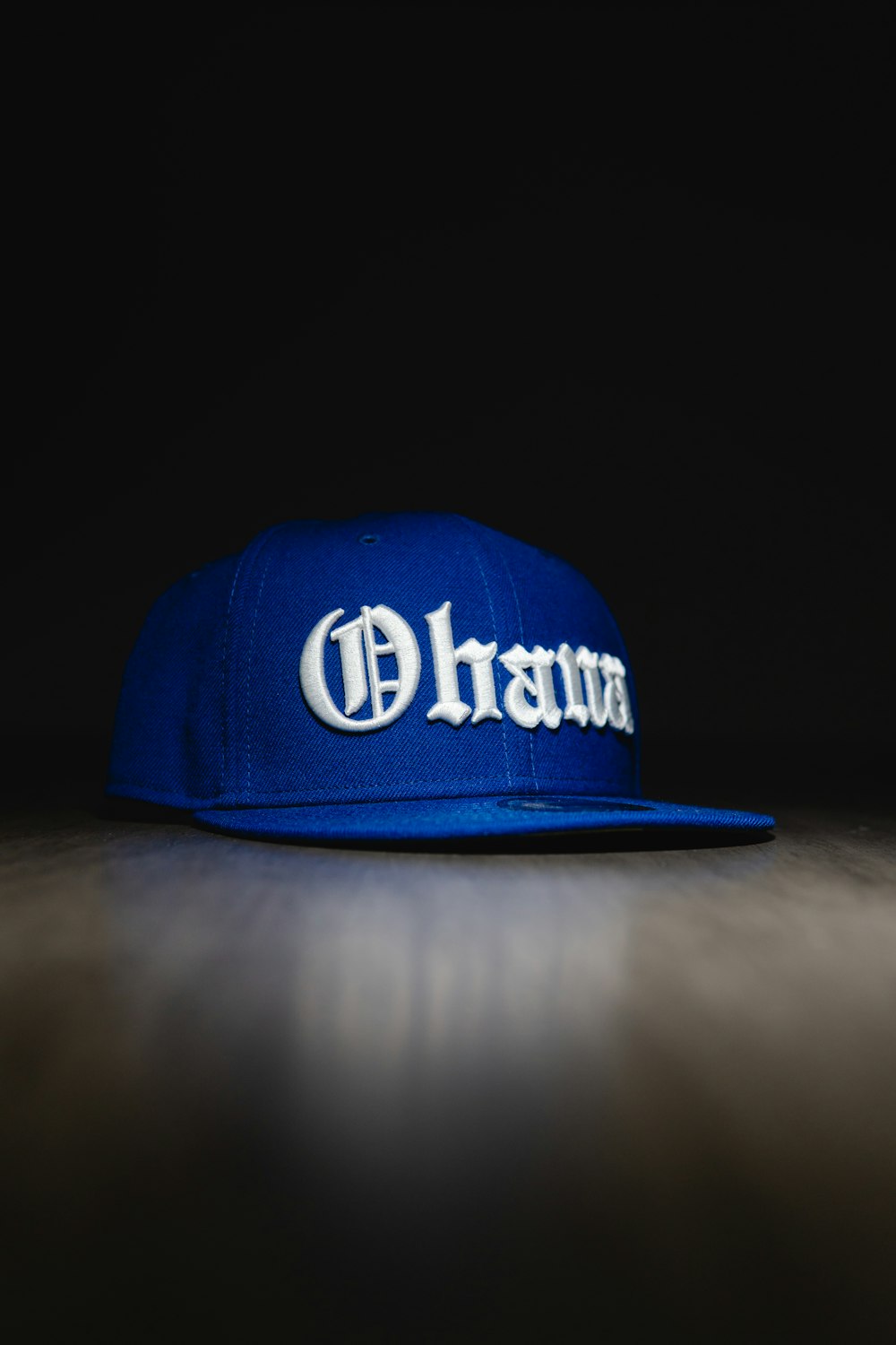 a blue hat with the word champion on it