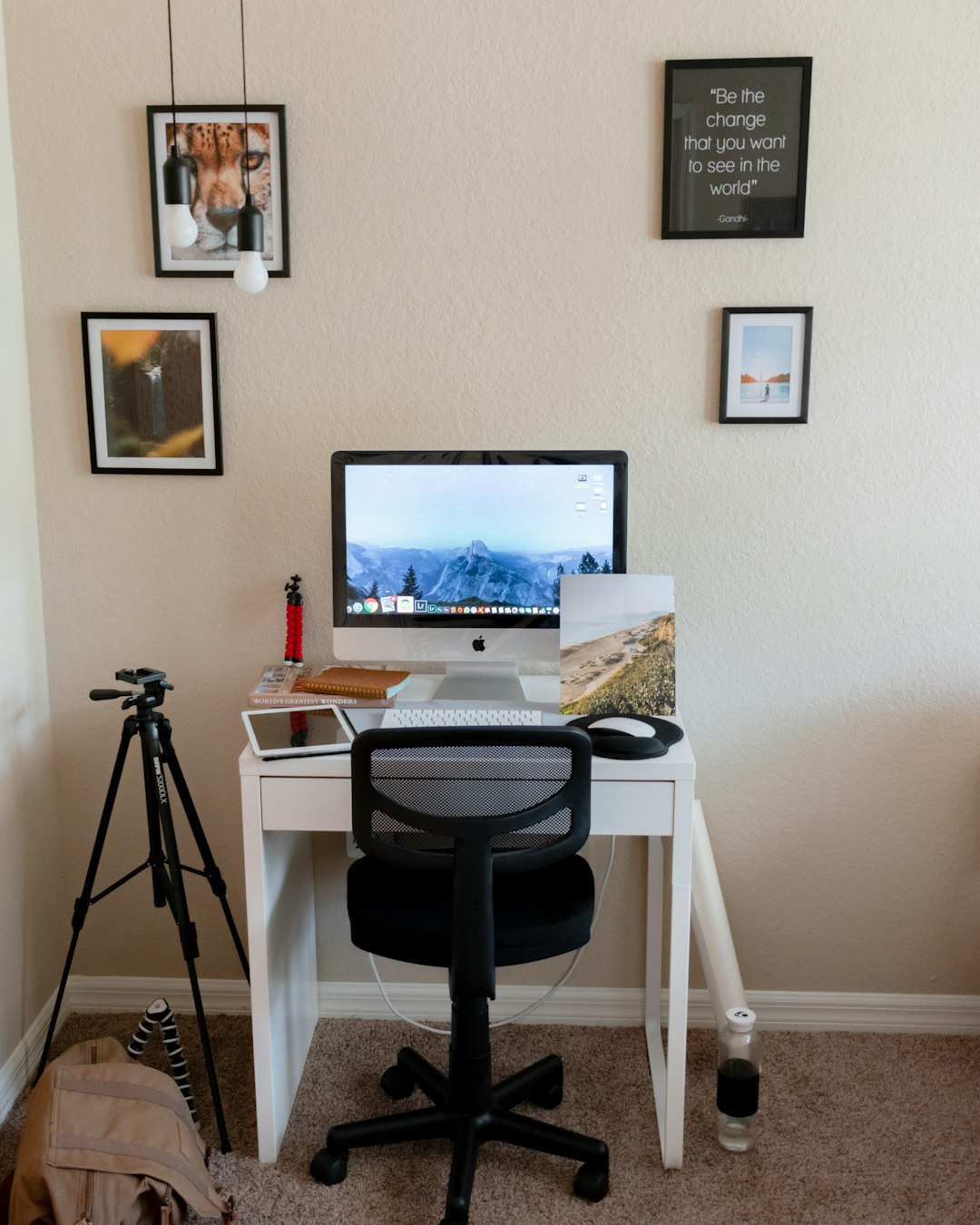 black flat screen computer monitor on brown wooden table