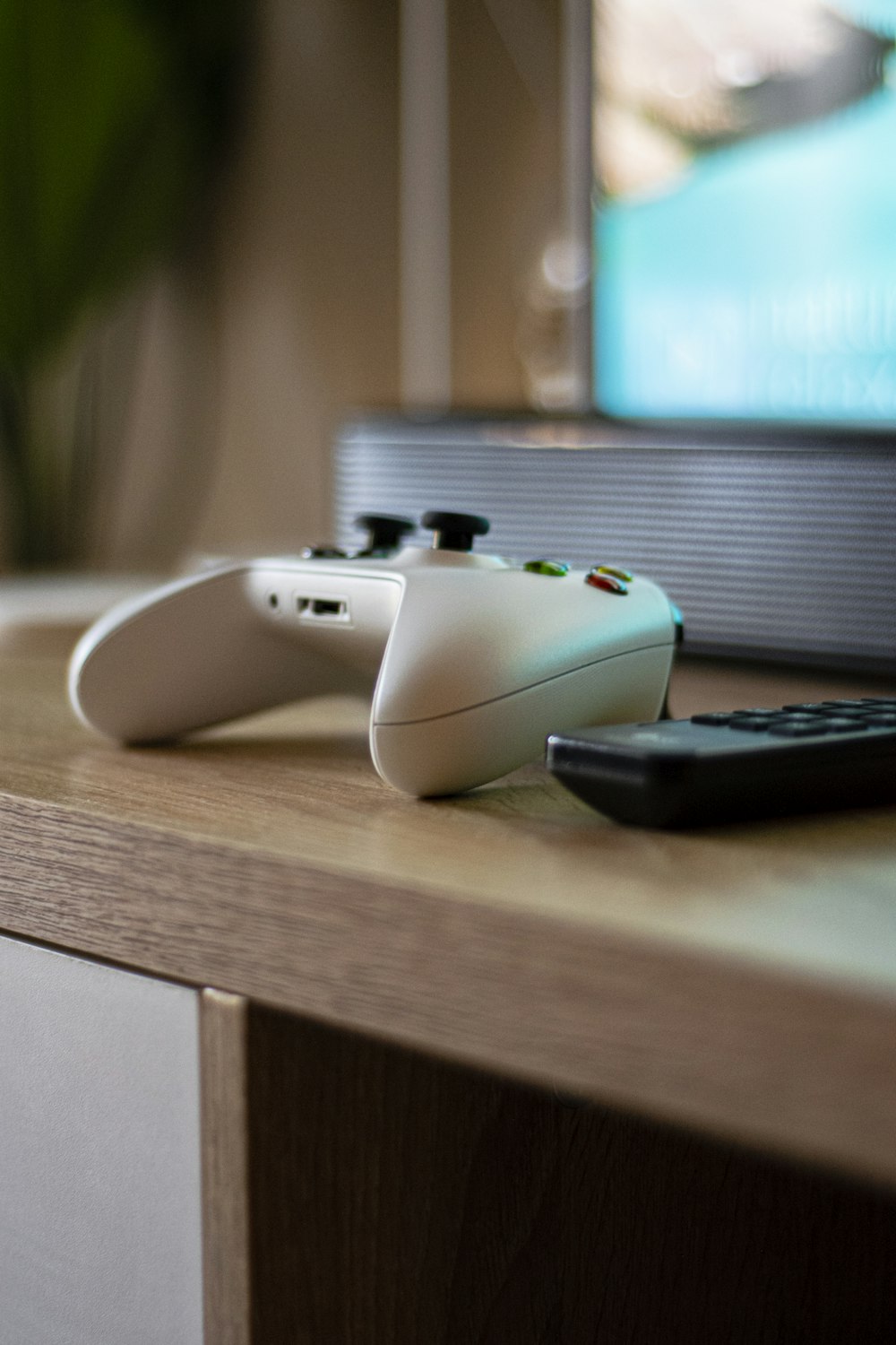 White xbox one game controller on brown wooden table photo – Free Mouse  Image on Unsplash