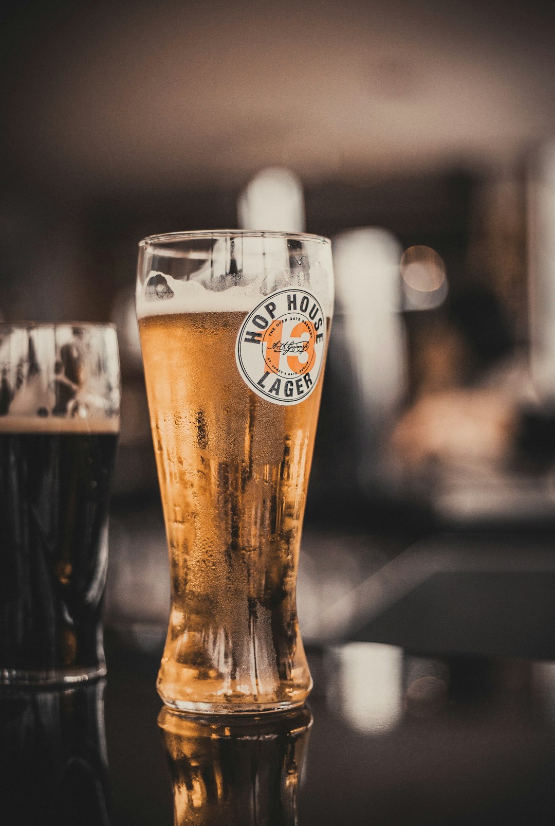 clear drinking glass with beer