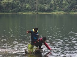 Children from the Allen family playing near a sparkling alien lake.