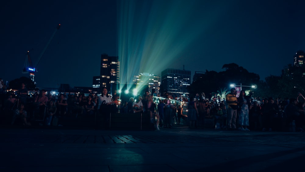 people walking on street during night time