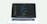 A laptop displaying a code editor with a dark theme, showing lines of colorful code. The environment is bright and minimalistic.