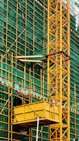 orange metal ladder on building