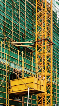 orange metal ladder on building