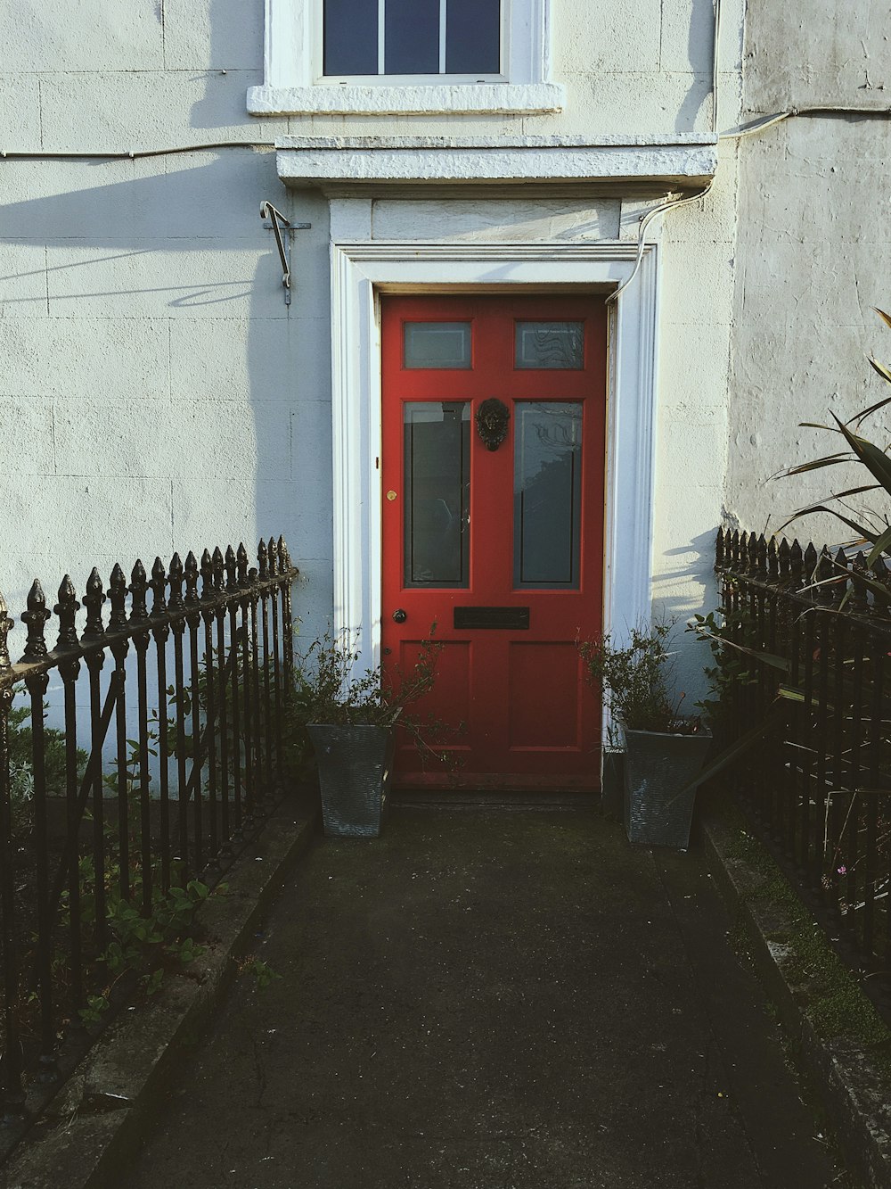 red and white wooden door