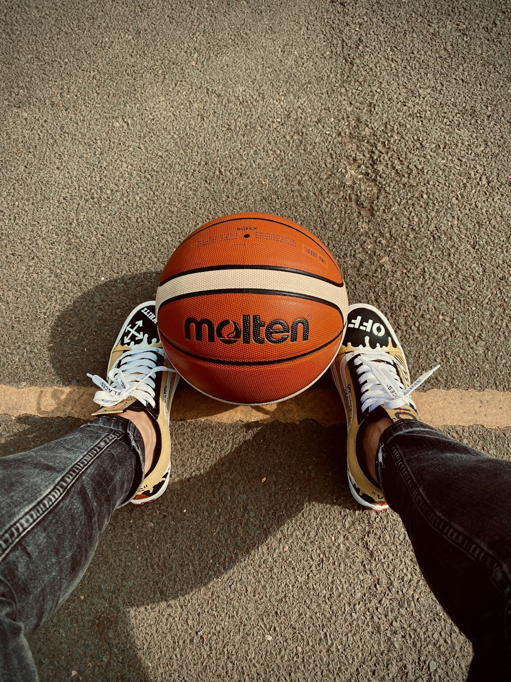 brown basketball on brown sand