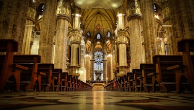 brown wooden chairs inside cathedral splendid teams background