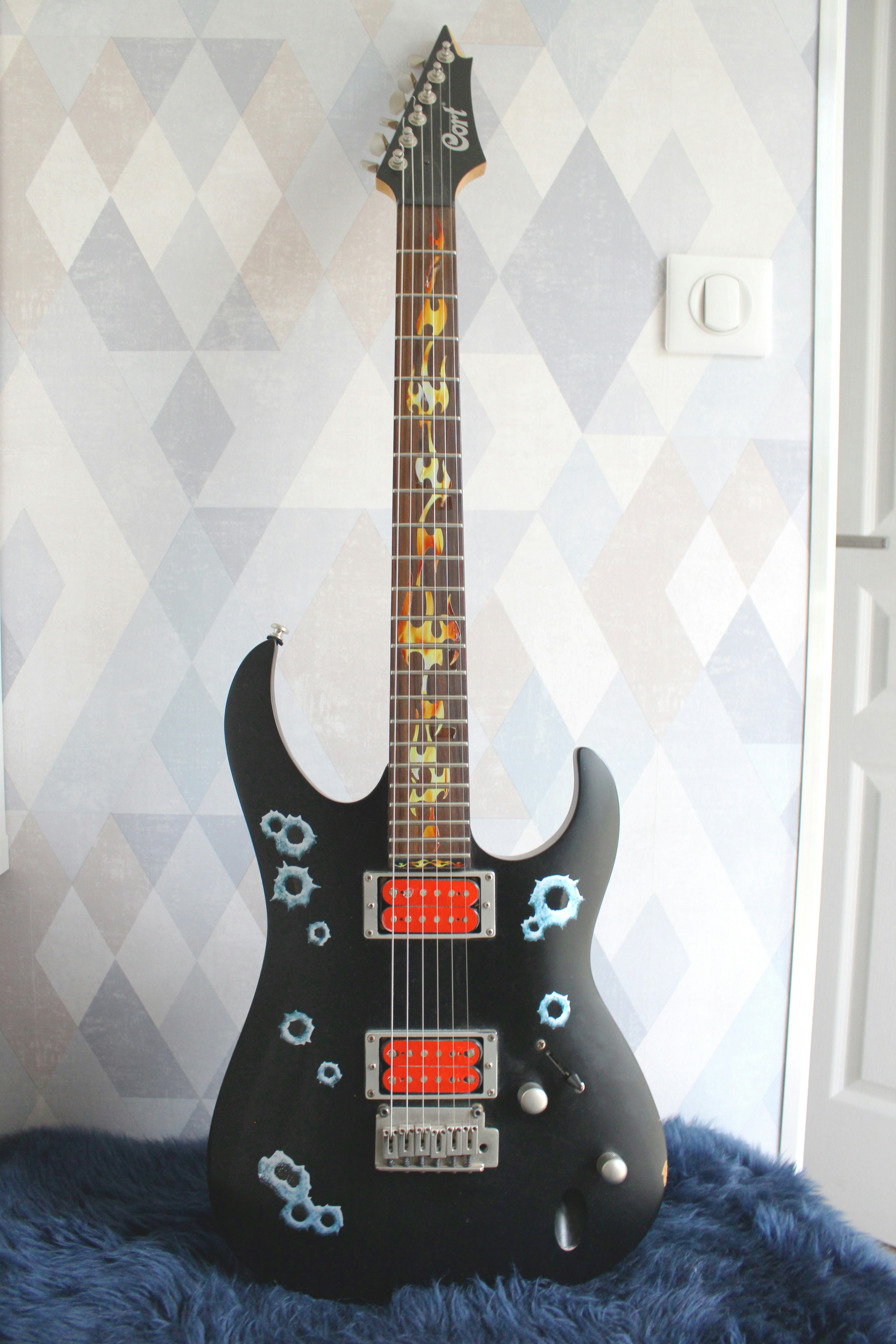 black and white stratocaster electric guitar