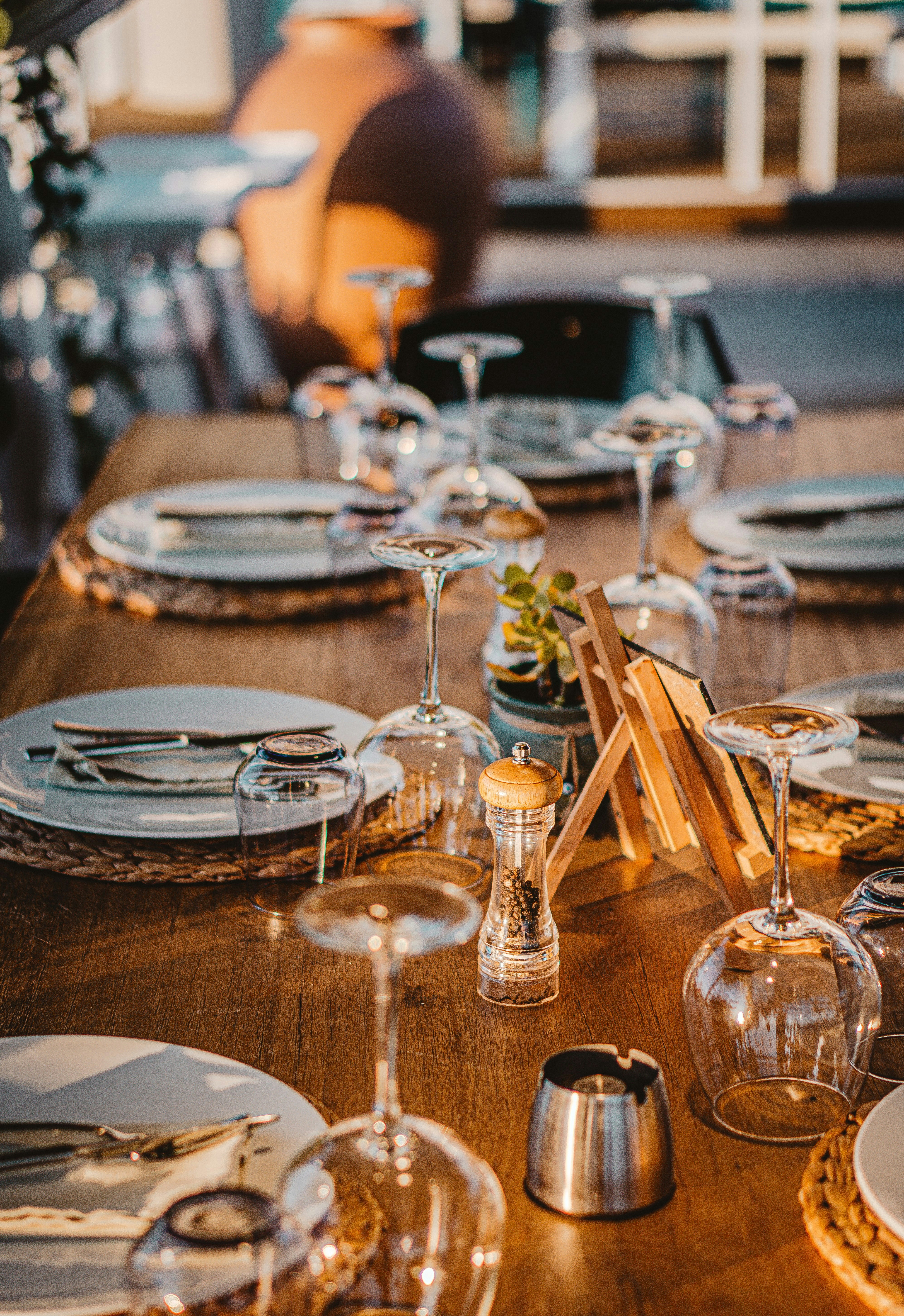 clear wine glasses on brown wooden table