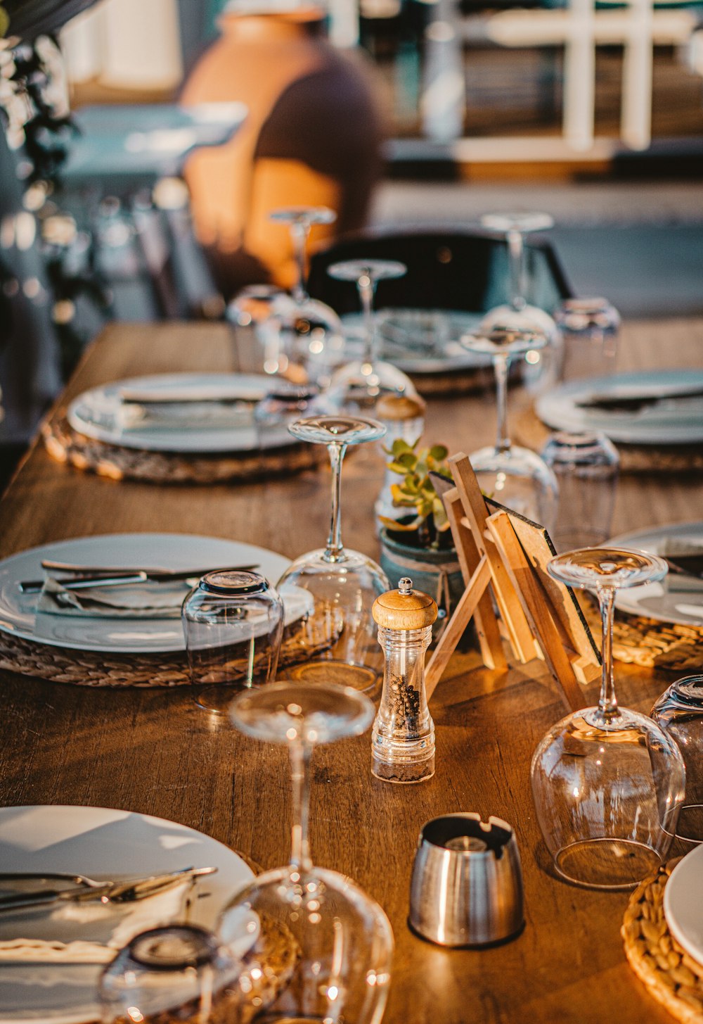 clear wine glasses on brown wooden table