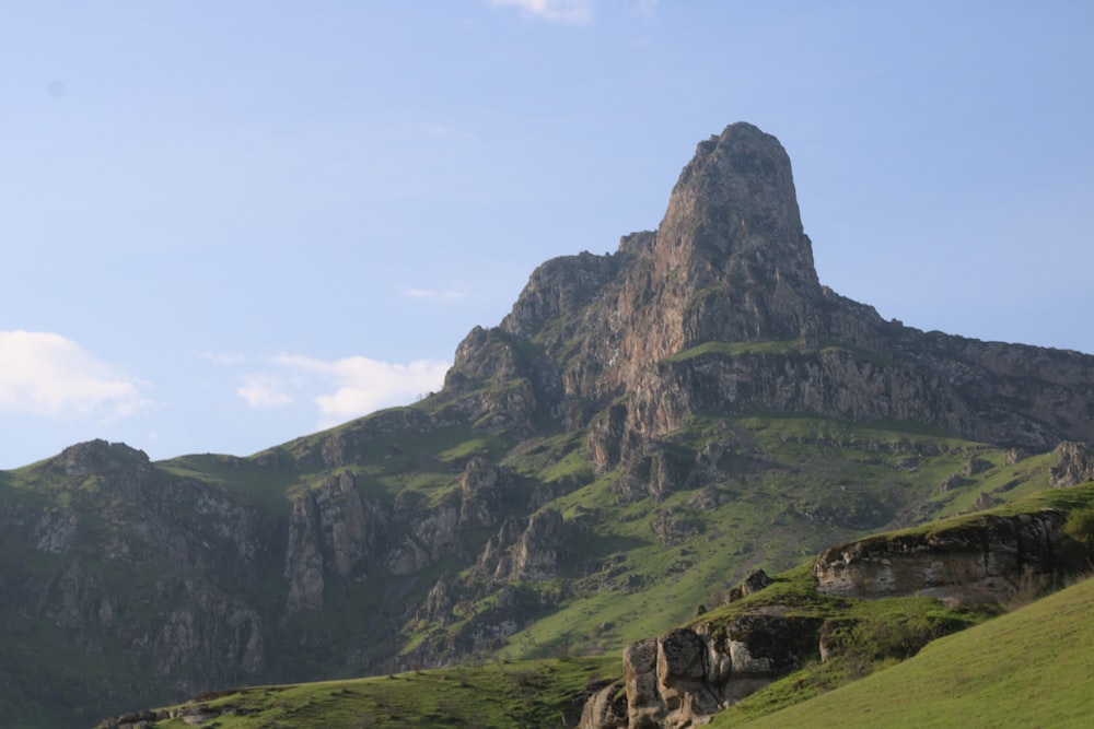 green and brown mountain under blue sky during daytime