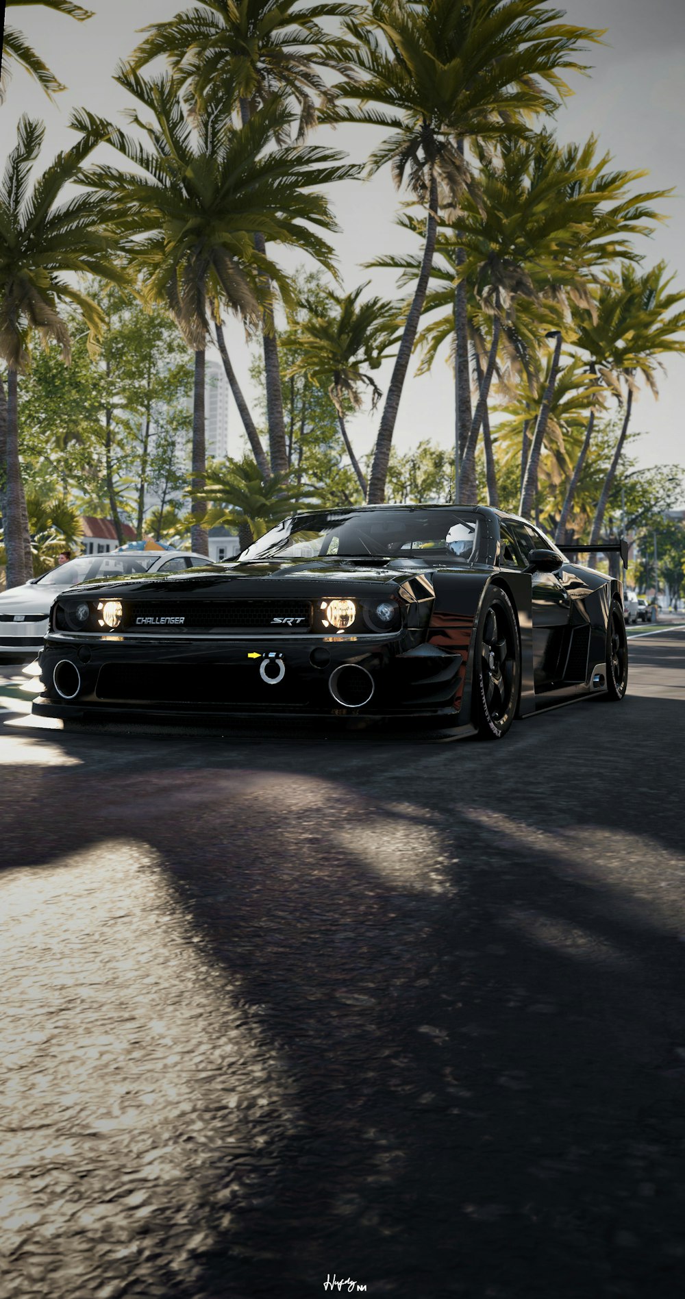 black bmw m 3 coupe parked on gray concrete pavement during daytime