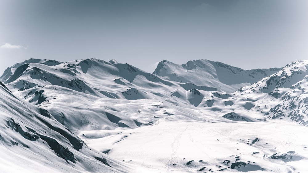 snow covered mountain under blue sky during daytime