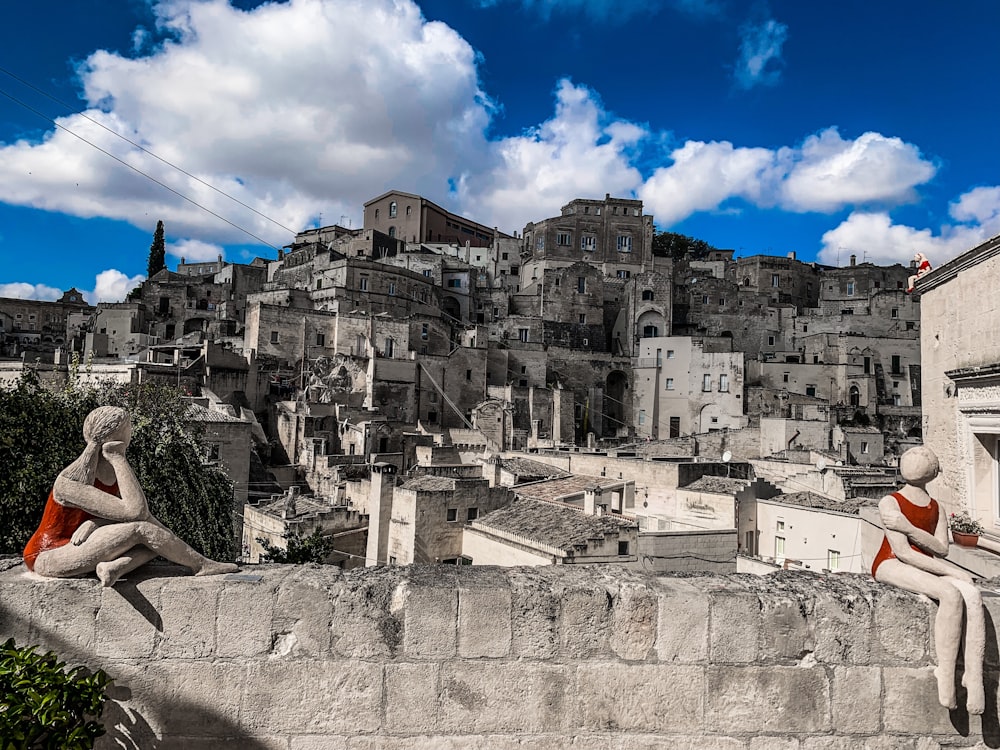 white and gray concrete buildings under blue sky during daytime