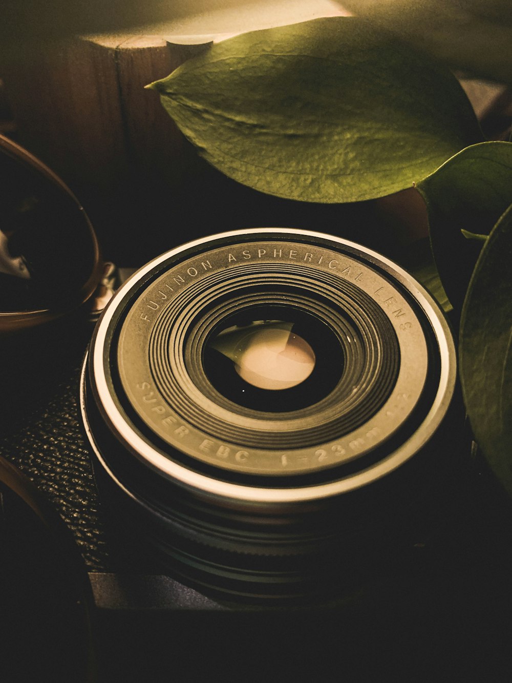 black camera lens on black textile