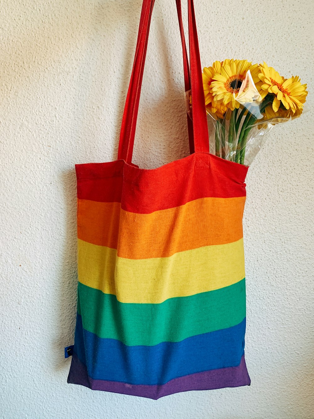 red blue and yellow striped tote bag