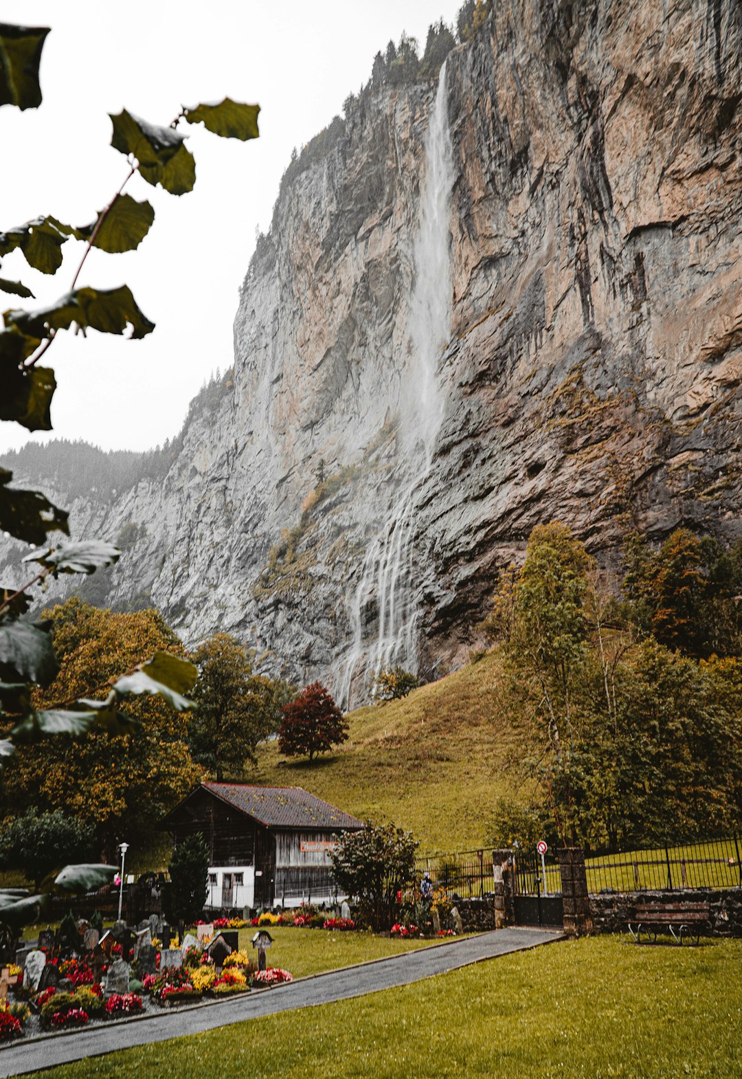 brown and white house near waterfalls