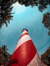 red and white tower under blue sky