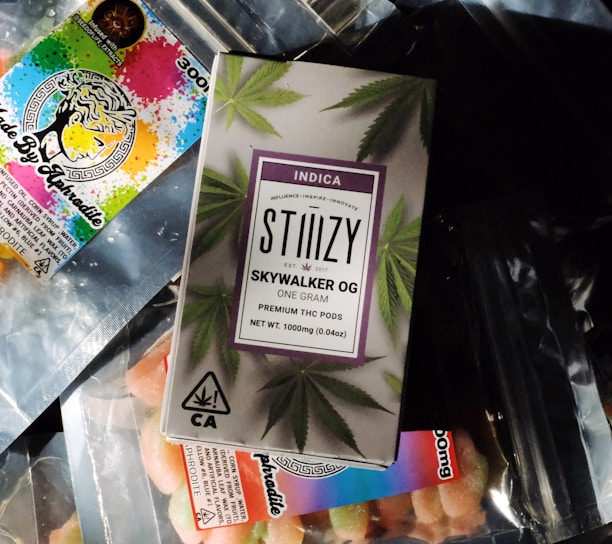 a package of marijuana sitting on top of a plastic bag