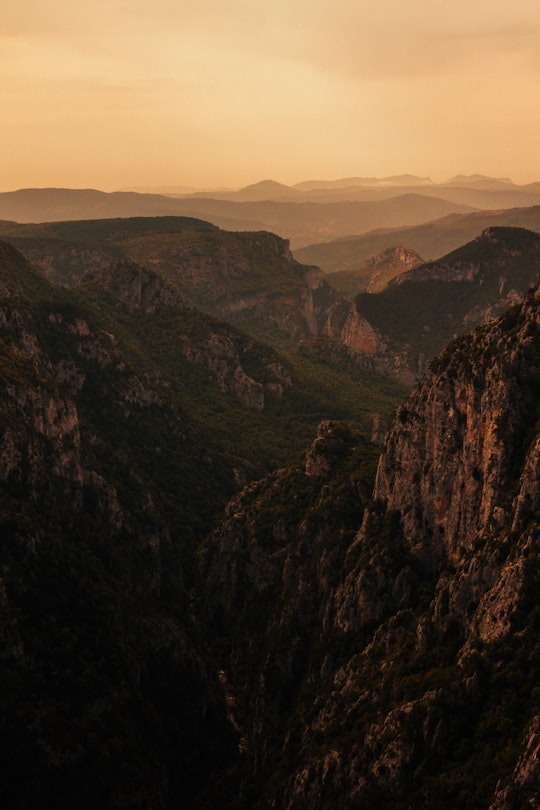 brown and green mountains under white sky during daytime in Kastamonu Turkey