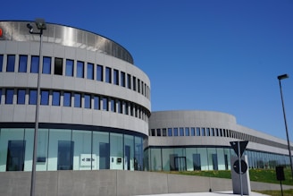 gray concrete building under blue sky during daytime