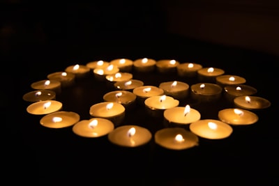 white candles on black surface ceremony google meet background