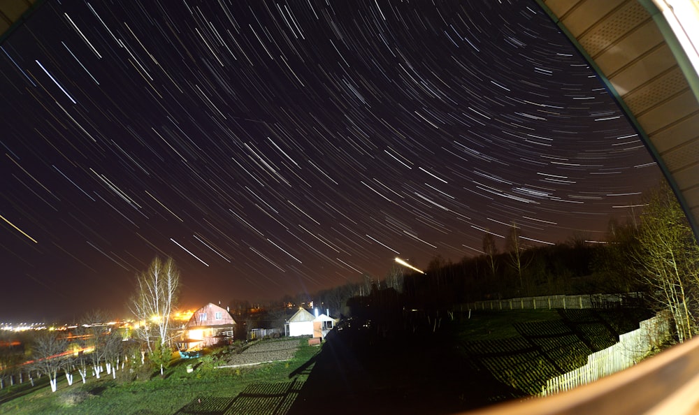 green grass field during night time