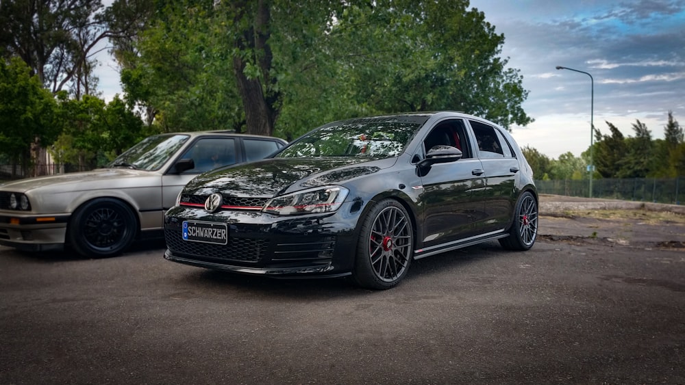 black audi coupe on road during daytime