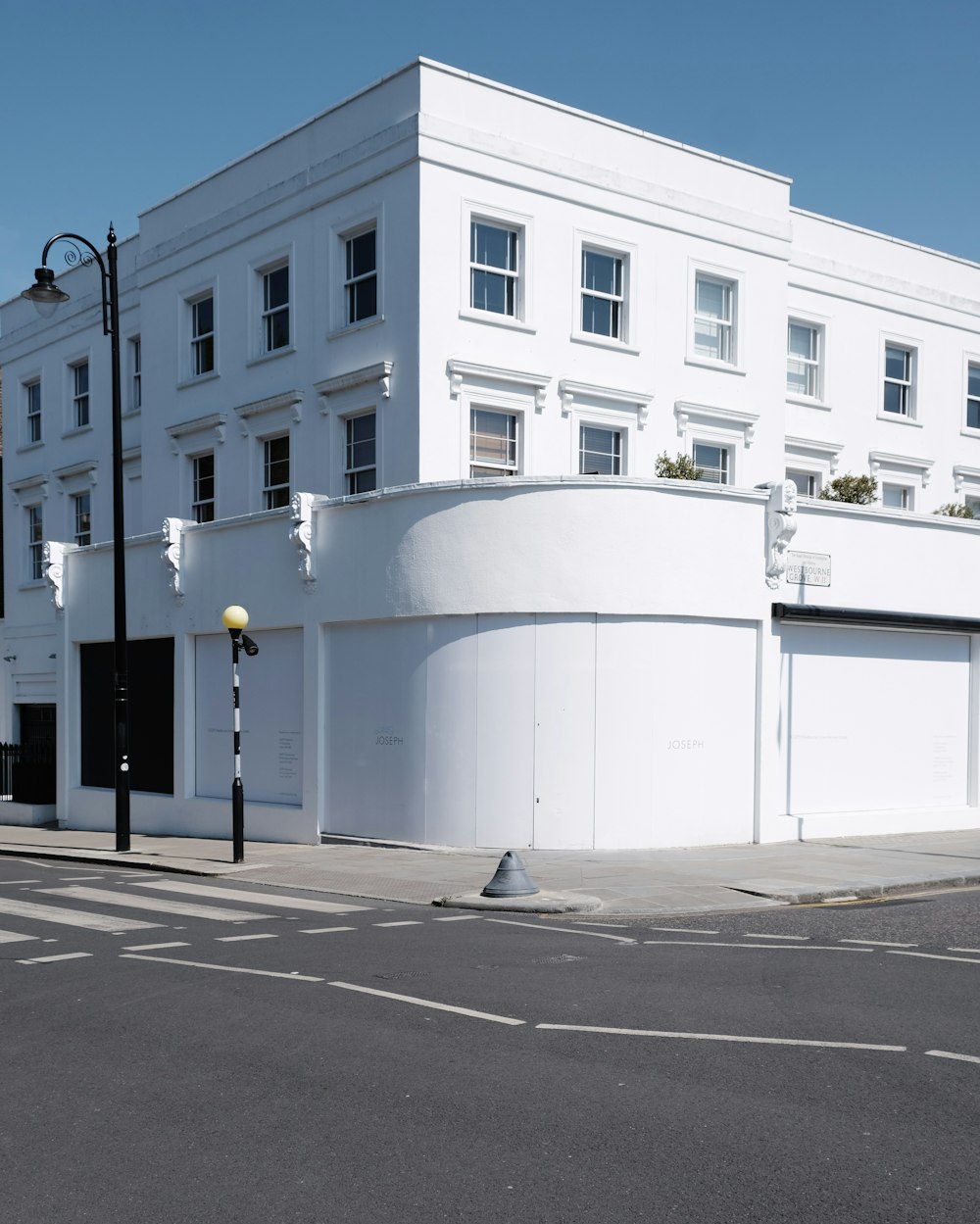 white concrete building near road during daytime