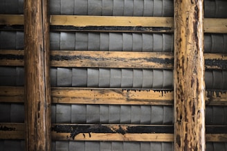 brown wooden frame with blue and white striped textile